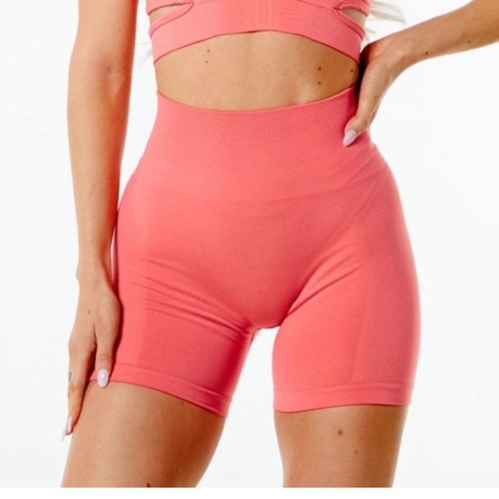 Alphalete Athletic Shorts in pixel pink with Relaxed Fit and Elastic Waistband
